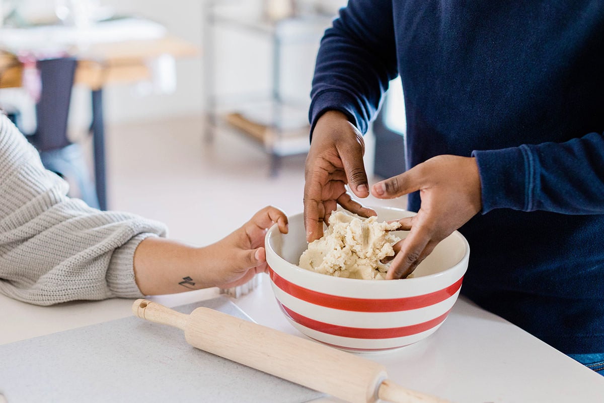 Couple making cookie dough