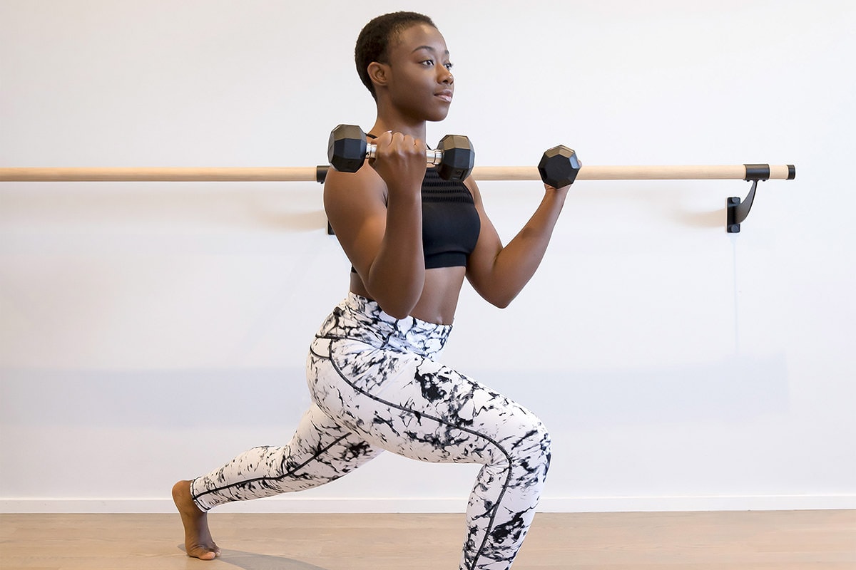 Woman exercising with weights