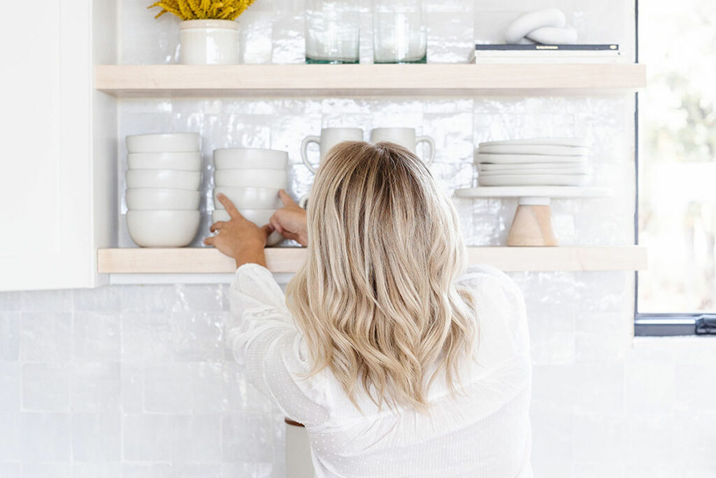 Value of Honesty 2 - Woman arranging kitchen shelves