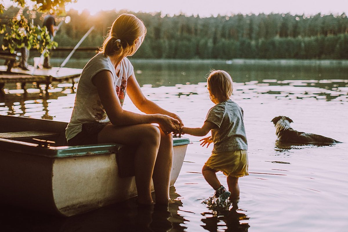 Being a Mom 6 | Mother, son & dog in pond with rowboat