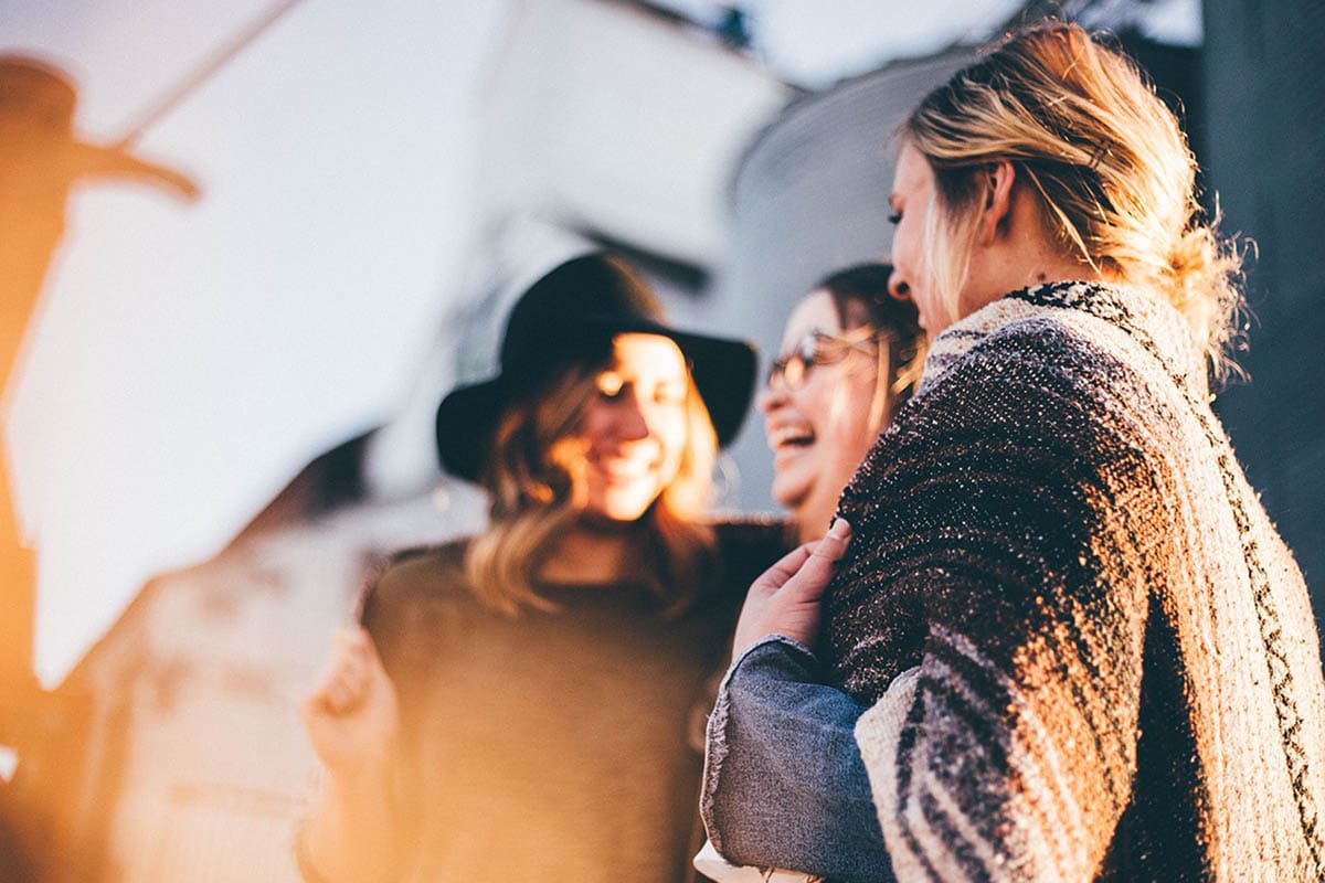 Group of women laughing and socializing